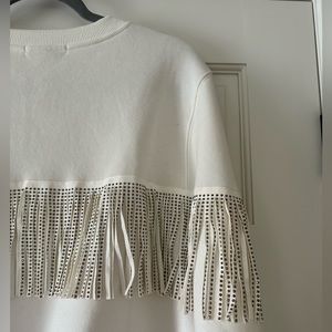 Slightly cropped fringe crew neck